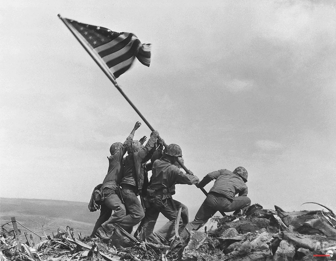 American Marines raising the flag on Mount Suribachi during the Battle of Iwo Jima
